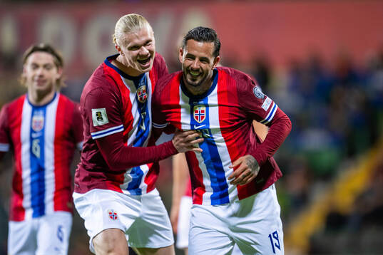 Aron Dønnum of Norway celebrates with teammate Erling