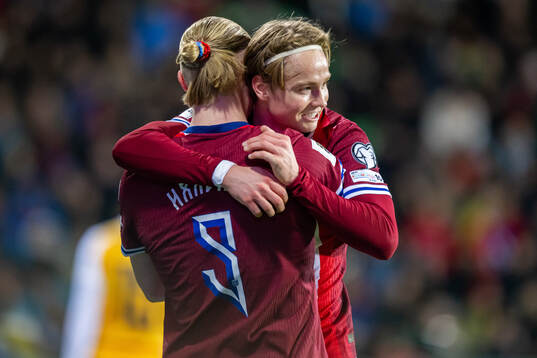 Erling Braut Haaland of Norway celebrates with teammate