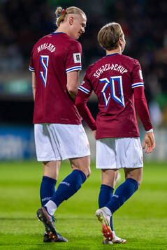 Erling Braut Haaland of Norway celebrates with teammate
