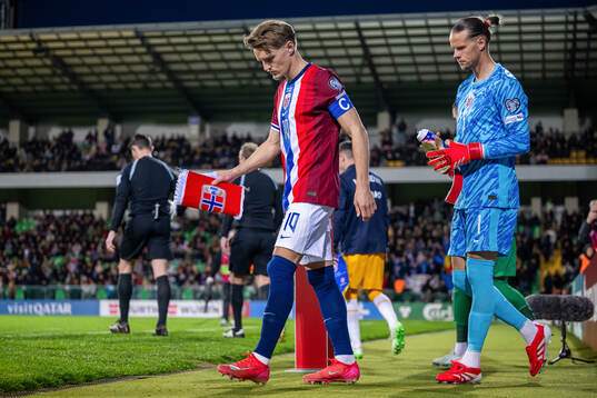 Martin Ødegaard and goalkeeper Ørjan Håskjold Nyland of