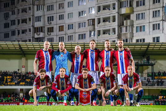 The starting eleven of Norway pose for a team photo