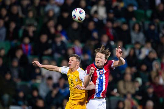 Vadim Rata of Moldova and Sander Berge of Norway