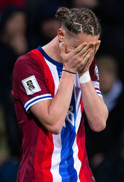 Thelo Aasgaard of Norway reacts