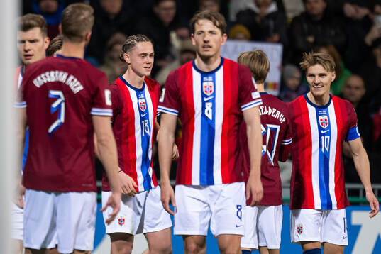 Thelo Aasgaard of Norway celebrates with teammates