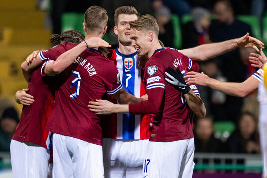 Alexander Sørloth of Norway celebrates with teammates