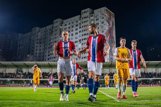 Thelo Aasgaard and Kristoffer Ajer of Norway at half-time