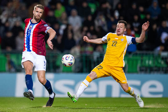 Kristoffer Ajer of Norway and Vadim Rata of Moldova