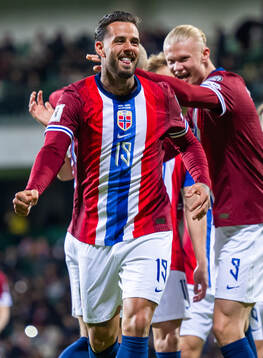 Aron Dønnum of Norway celebrates with teammate Erling
