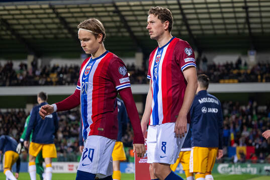 Andreas Schjelderup and Sander Berge of Norway enter the