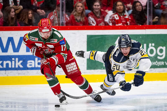 Modos Riley Woods och HV71s Andre Petersson