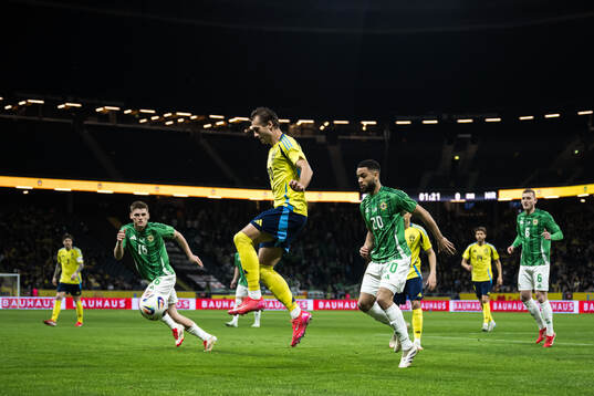 Justin Devenny and Brodie Spencer of Northern Ireland and