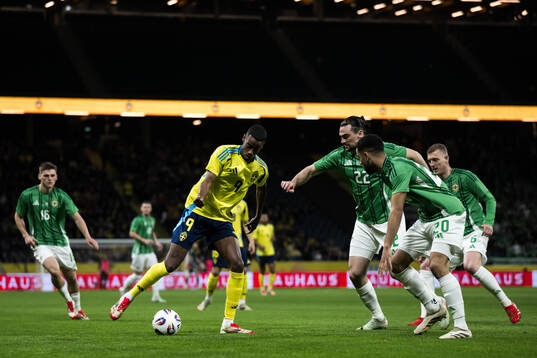 Alexander Isak of Sweden and Ciaron Brown of Northern