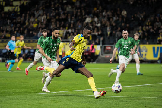 Brodie Spencer of Northern Ireland and Alexander Isak of