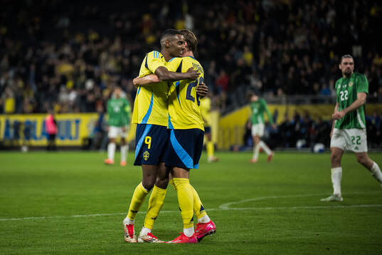 Alexander Isak and Benjamin Nygren of Sweden celebrating