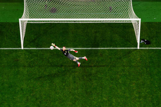 Goalkeeper Viktor Johansson of Sweden lets in the 5-1 goal