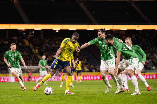 Alexander Isak of Sweden and Ciaron Brown of Northern