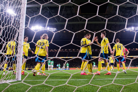 Benjamin Nygren and Gabriel Gudmundsson of Sweden celebrate