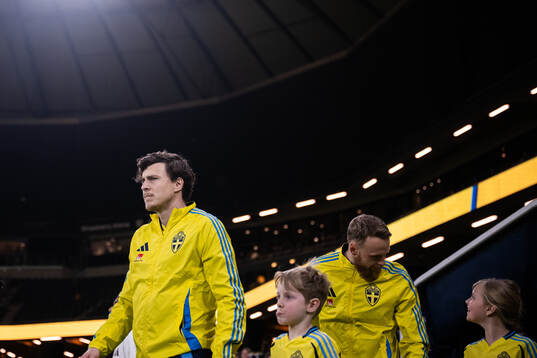 Victor Nilsson Lindelöf and goalkeeper Viktor Johansson of