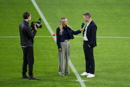 Head coach Jon Dahl Tomasson of Sweden and TV-presenter