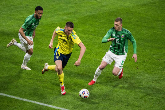 Emil Holm of Sweden against Brodie Spencer and George