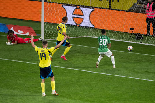 Benjamin Nygren of Sweden scores the 2-0 goal against