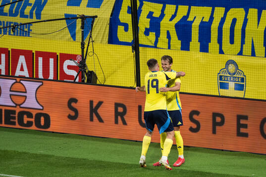Benjamin Nygren and Emil Holm of Sweden celebrating the 2-0