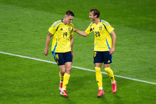 Emil Holm and Benjamin Nygren of Sweden celebrate