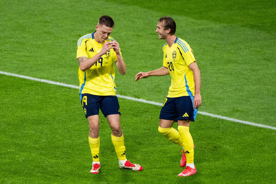 Emil Holm and Benjamin Nygren of Sweden celebrate