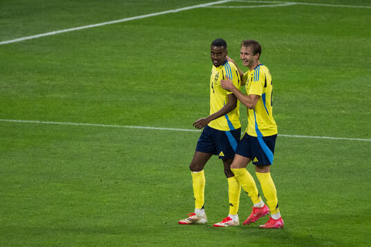 Alexander Isak and Benjamin Nygren of Sweden celebrating