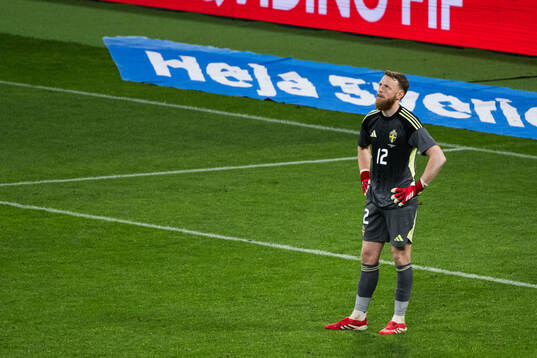 Goalkeeper Viktor Johansson of Sweden looks dejected