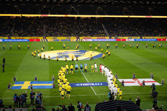 Players of Sweden and of Northern Ireland