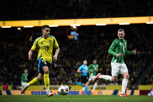 Yasin Ayari of Sweden and George Saville of Northern Ireland