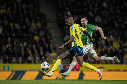 Alexander Isak of Sweden and Ciaron Brown of Northern