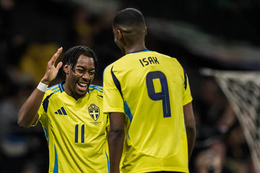 Anthony Elanga and Alexander Isak of Sweden celebrating the
