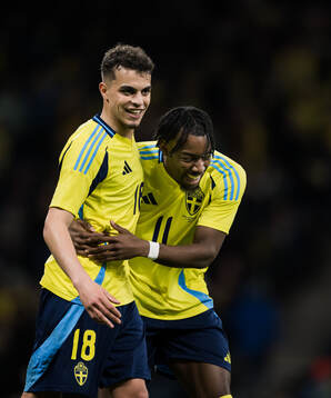Yasin Ayari and Anthony Elanga of Sweden celebrating the