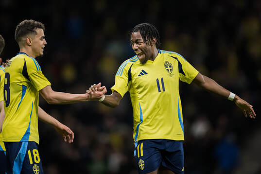 Yasin Ayari and Anthony Elanga of Sweden celebrating the