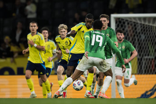 Alexander Isak of Sweden and Shea Charles of Northern