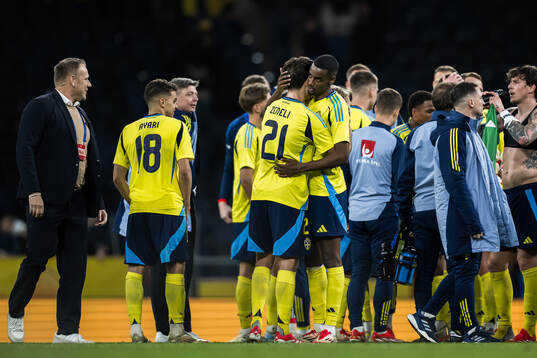 Besfort Zeneli and Alexander Isak of Sweden celebrate