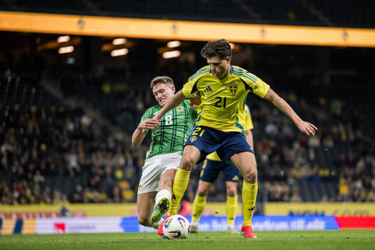 Callum Marshall of Northern Ireland and Besfort Zeneli of