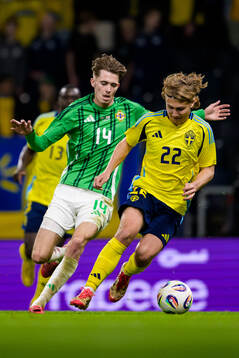 Isaac Price of Northern Ireland and Sebastian Nanasi of