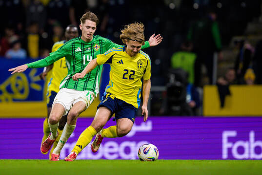 Isaac Price of Northern Ireland and Sebastian Nanasi of