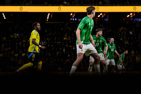 Anthony Elanga of Sweden and Ruairi McConville, Paddy