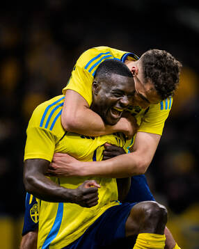 Ken Sema and Yasin Ayari of Sweden celebrate the 3-0 goal