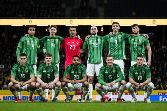 The starting eleven of Northern Ireland pose for a team