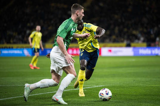 Jamie Donley of Northern Ireland and Ken Sema of Sweden