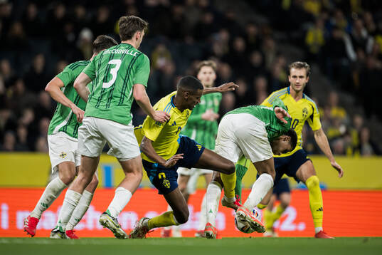 Alexander Isak of Sweden and Shea Charles of Northern