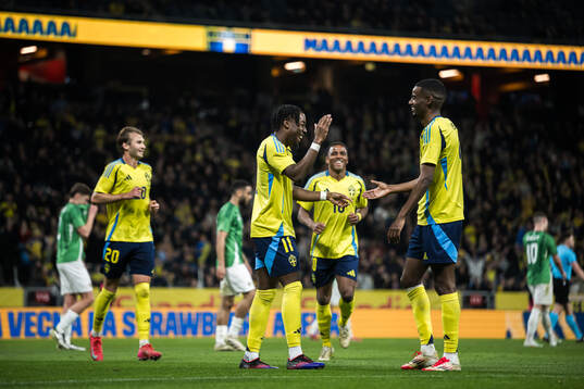 Anthony Elanga and Alexander Isak of Sweden celebrating the
