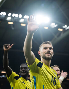 Ken Sema and Jesper Karlström of Sweden celebrate