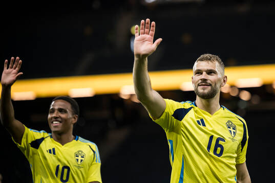 Niclas Eliasson and Jesper Karlström of Sweden celebrate