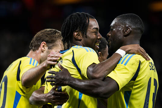 Anthony Elanga and Ken Sema of Sweden celebrate the 5-0 goal